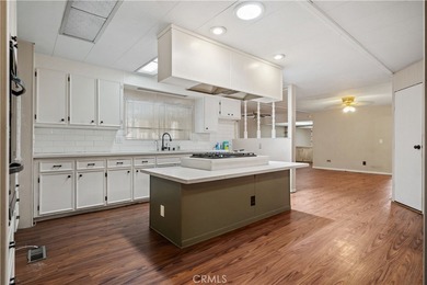 Spacious and inviting triple-wide home in a welcoming 55+