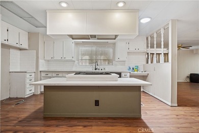 Spacious and inviting triple-wide home in a welcoming 55+