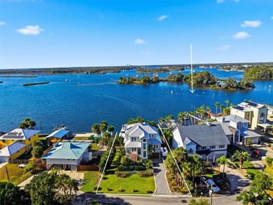 EXTREMELY RARE chance to own a stunning home RIGHT on King's Bay