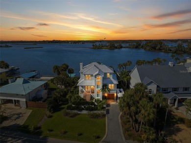 EXTREMELY RARE chance to own a stunning home RIGHT on King's Bay