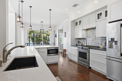 EXTREMELY RARE chance to own a stunning home RIGHT on King's Bay