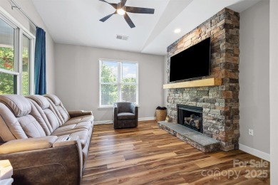 Enjoy low-maintenance lakeside living in this beautifully