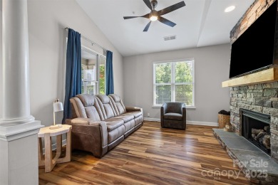 Enjoy low-maintenance lakeside living in this beautifully