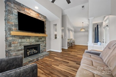 Enjoy low-maintenance lakeside living in this beautifully