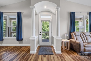 Enjoy low-maintenance lakeside living in this beautifully