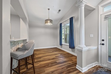 Enjoy low-maintenance lakeside living in this beautifully