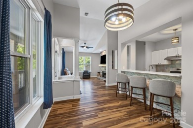 Enjoy low-maintenance lakeside living in this beautifully