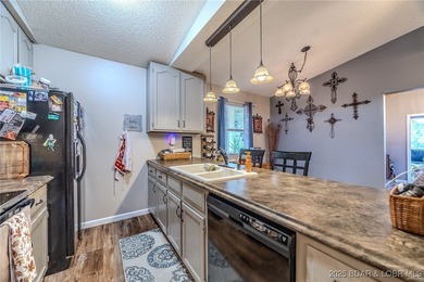 Escape to your own slice of the lake with this 3 bedroom 2 bath