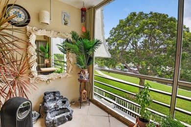 Welcome to waterfront living at sun-swept Unit 203 in