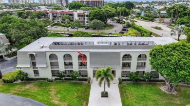 Welcome to waterfront living at sun-swept Unit 203 in