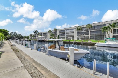 Welcome to waterfront living at sun-swept Unit 203 in