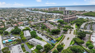 Welcome to waterfront living at sun-swept Unit 203 in