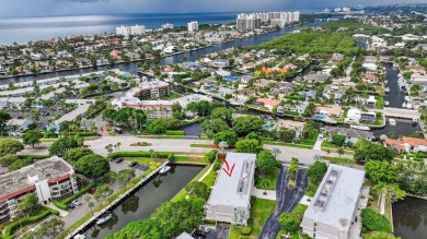 Welcome to waterfront living at sun-swept Unit 203 in