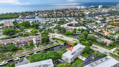 Welcome to waterfront living at sun-swept Unit 203 in