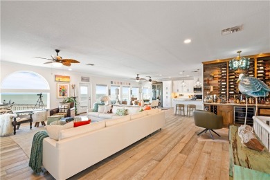 Tucked behind the gates of Sea Shell Shores, lies a home of