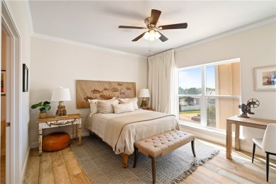 Tucked behind the gates of Sea Shell Shores, lies a home of