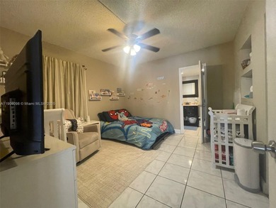 VERY SPACIOUS AND BRIGHT, WITH TWO LEVEL LIVING ROOM, THIS IS A