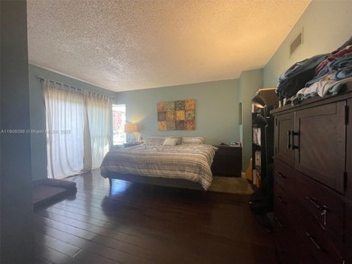 VERY SPACIOUS AND BRIGHT, WITH TWO LEVEL LIVING ROOM, THIS IS A