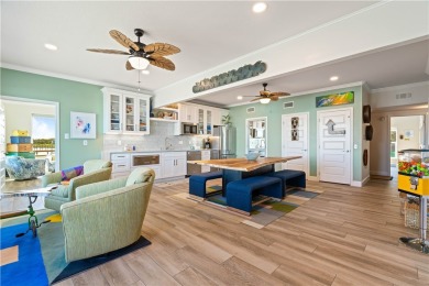 Tucked behind the gates of Sea Shell Shores, lies a home of