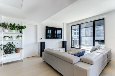 Appartement moderne de 2 chambres avec stationnement interieur