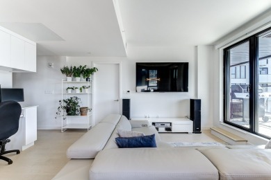 Appartement moderne de 2 chambres avec stationnement interieur