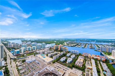 FULL-FLOOR DESIGNER OCEANFRONT LOWER PENTHOUSE WITH UNOBSTRUCTED