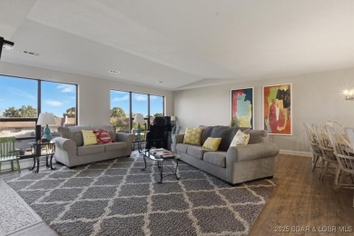 Enjoy the best of lake living in this beautifully remodeled