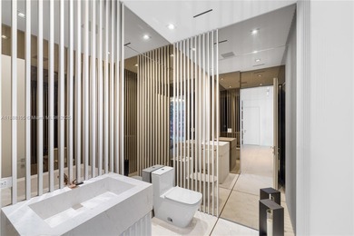 FULL-FLOOR DESIGNER OCEANFRONT LOWER PENTHOUSE WITH UNOBSTRUCTED