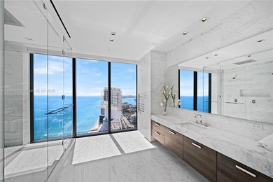 FULL-FLOOR DESIGNER OCEANFRONT LOWER PENTHOUSE WITH UNOBSTRUCTED