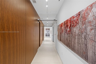 FULL-FLOOR DESIGNER OCEANFRONT LOWER PENTHOUSE WITH UNOBSTRUCTED