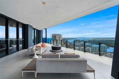 FULL-FLOOR DESIGNER OCEANFRONT LOWER PENTHOUSE WITH UNOBSTRUCTED