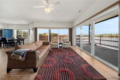 Experience lake living at its finest with this beautifully