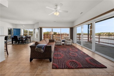 Experience lake living at its finest with this beautifully