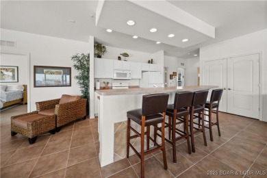 Experience lake living at its finest with this beautifully