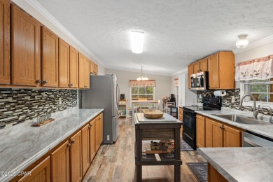 Nestled at the end of a quiet paved cul-de-sac, this spacious