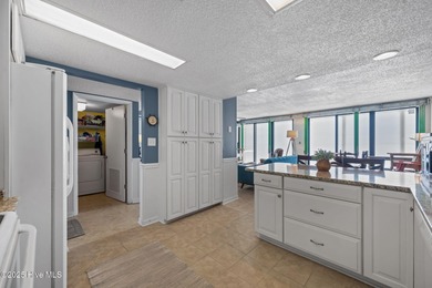 Discover coastal luxury in this rare fifth-floor, two-bedroom