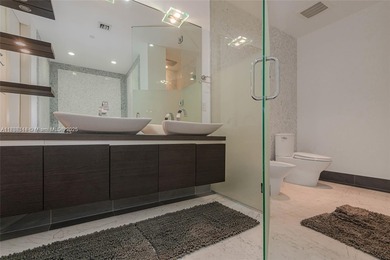 Experience elevated luxury living in this lower-penthouse