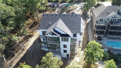 Discover the New Standard of Lake Luxury Living.This stunning