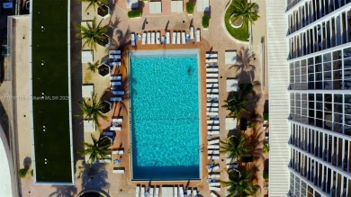 Experience beachfront luxury in this beautifully appointed 2 bed