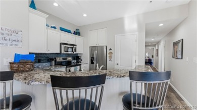 Enjoy incredible lake views from this spacious 4-bedroom, 3-bath