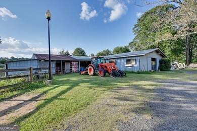 25+ Acre Lakefront Equestrian Estate with Updated All-Brick