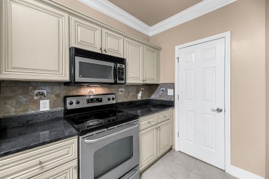 This luxury 2-bedroom, 2-bath condo at Pelican Pointe Villas
