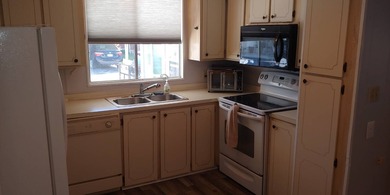 Price:  $54,900.00  ~  Monthly Lot Lease:  $610.00  ~  Monthly