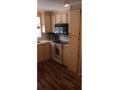 Price:  $54,900.00  ~  Monthly Lot Lease:  $610.00  ~  Monthly