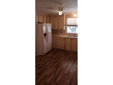 Price:  $54,900.00  ~  Monthly Lot Lease:  $610.00  ~  Monthly