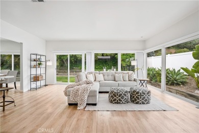 Enjoy coastal living in this inviting pool home with ocean views