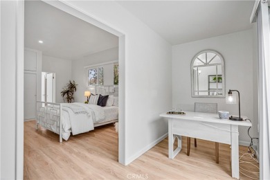 Enjoy coastal living in this inviting pool home with ocean views