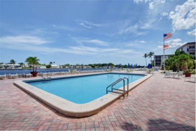 PRICE IMPROVEMENT! Enjoy South Florida living in this charming