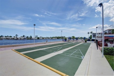 PRICE IMPROVEMENT! Enjoy South Florida living in this charming