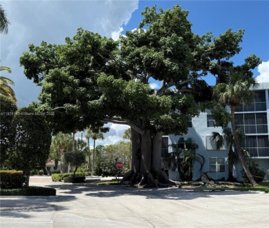 PRICE IMPROVEMENT! Enjoy South Florida living in this charming